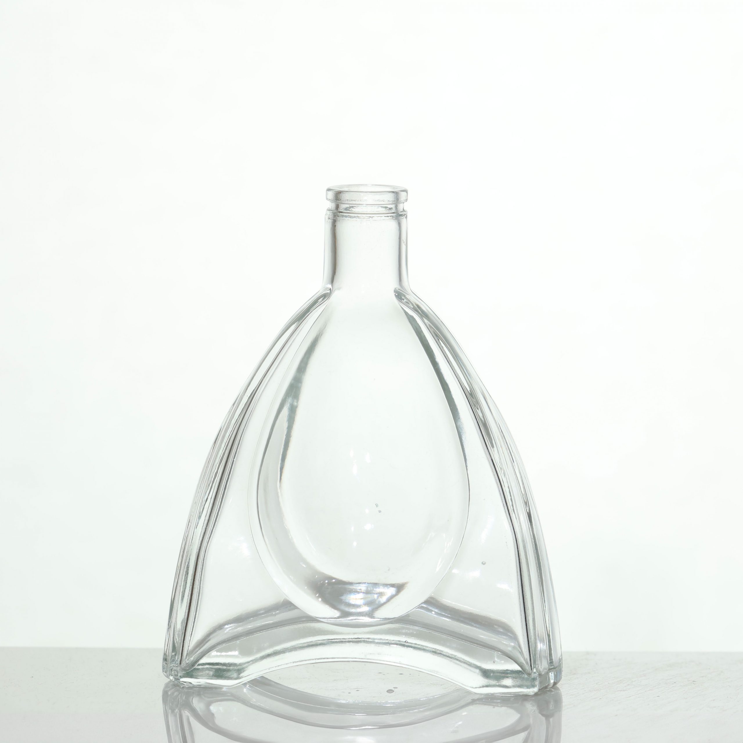 Clear glass bottle for the alcohol of your choice! We can create bottles in any custom shape.